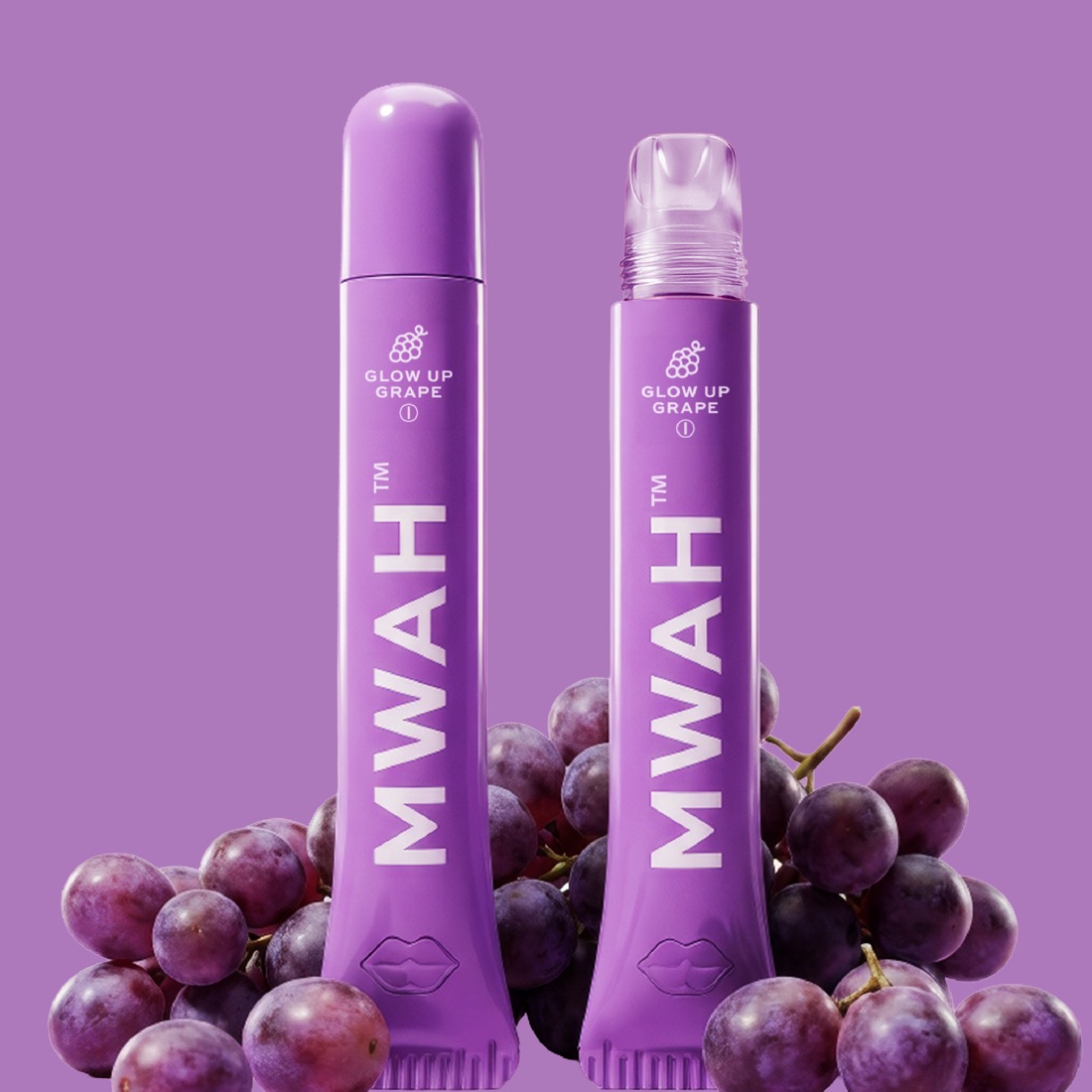 Glow Up Grape MWAH vape pens styled with purple grapes