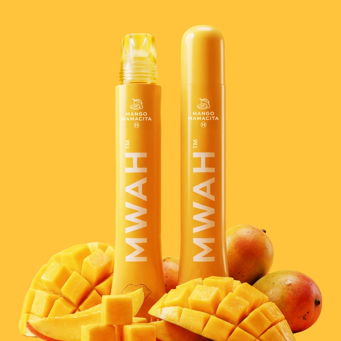 Mango Mamacita MWAH vape pens styled with fresh cut mango