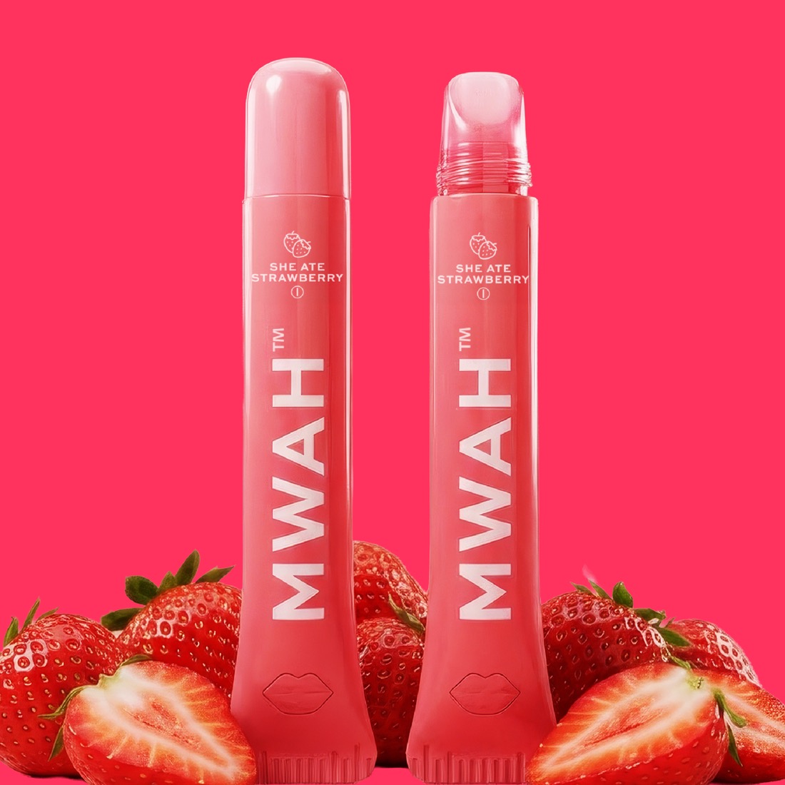 She Ate Strawberry MWAH vape pens styled with fresh strawberries
